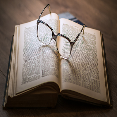 a book with glasses